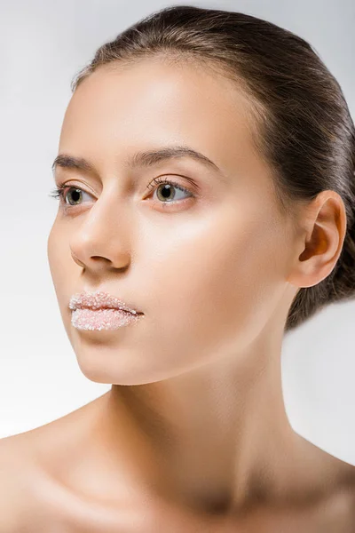 Young beautiful woman with sugar on lips — Stock Photo