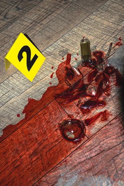 Blood at fresh crime scene with evidence marker — Stock Photo