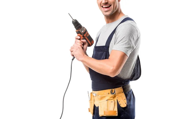 Partial view of worker with tool belt and drill isolated on white — Stock Photo