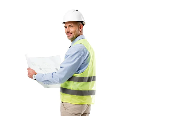 Engineer in helmet looking at camera and holding blueprint isolated on white — Stock Photo