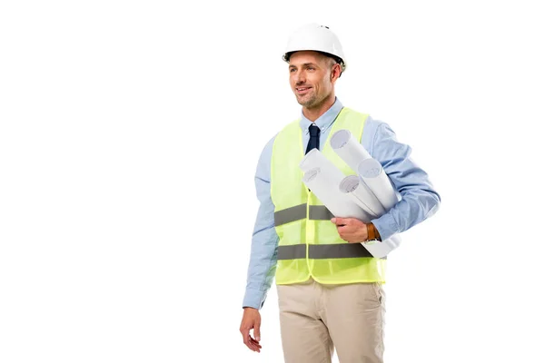Smiling engineer holding blueprints and looking away isolated on white — Stock Photo