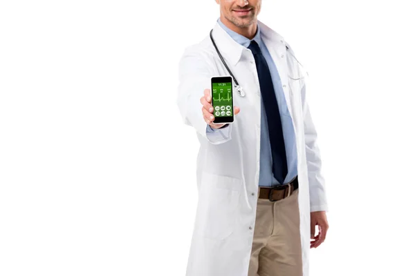 Cropped view of doctor holding smartphone with health data app on screen isolated on white — Stock Photo