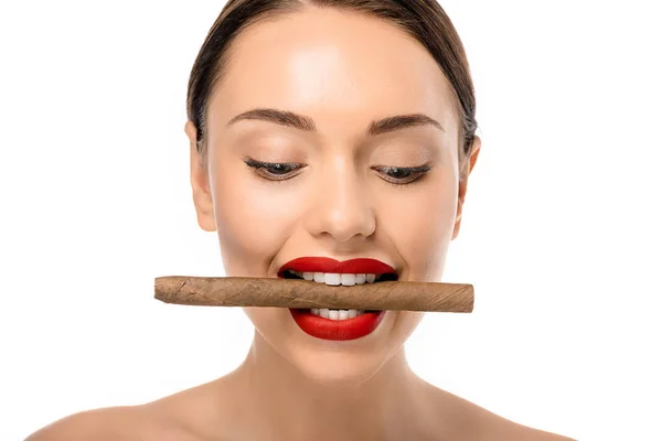 Beautiful naked girl holding cigar in teeth and looking down isolated on white — Stock Photo