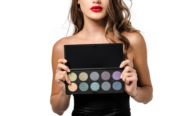 Cropped view of girl holding palette with eyeshadows isolated on white — Stock Photo