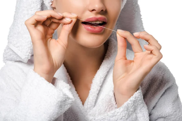 Cropped view of girl brushing teeth with dental floss isolated on white — Stock Photo