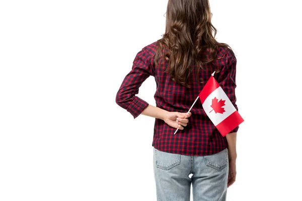 Vista posteriore della donna con bandiera canadese isolata sul bianco — Foto stock