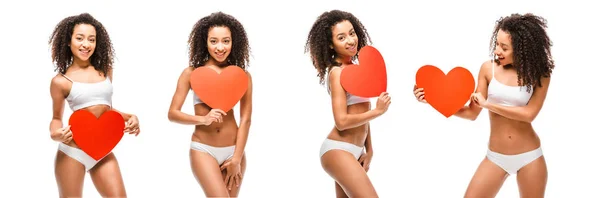 Collage de chica afroamericana clonada en ropa interior sosteniendo tarjetas en forma de corazón aisladas en blanco - foto de stock