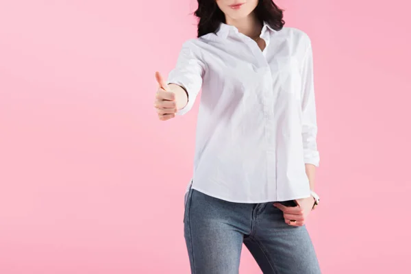 Cropped view of brunette woman showing thumb up, isolated on pink — Stock Photo