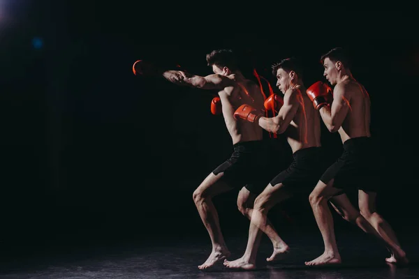 Sequenza colpo di forte maglione pugile muscolare in guanti da boxe facendo pugno — Foto stock