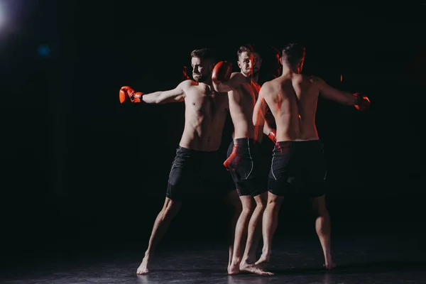 Exposição múltipla de forte shirtless lutador mma muscular em luvas de boxe fazendo soco e virar — Fotografia de Stock
