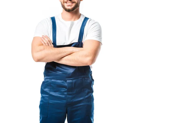 Corte vista de mover em uniforme com os braços cruzados isolado em branco com espaço de cópia — Fotografia de Stock