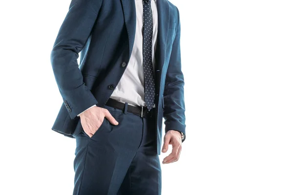 Partial view of businessman in suit with hand in pocket isolated on white — Stock Photo