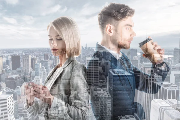 Double exposure of handsome businessman and pretty businesswoman and new york cityscape — Stock Photo