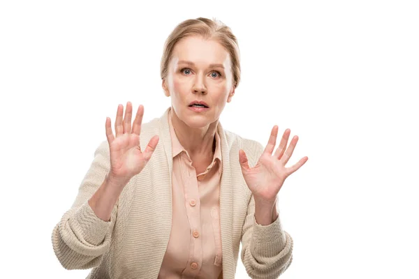 Chocado meia idade mulher Gesturing com as mãos Isolado no branco — Fotografia de Stock