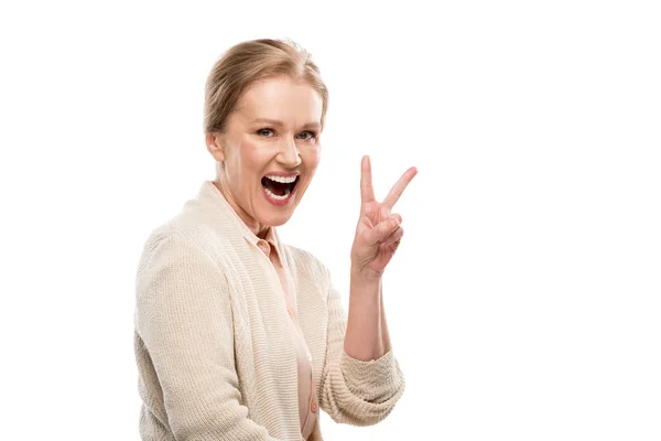 Excited middle aged woman showing Peace Sign Isolated On White — Stock Photo