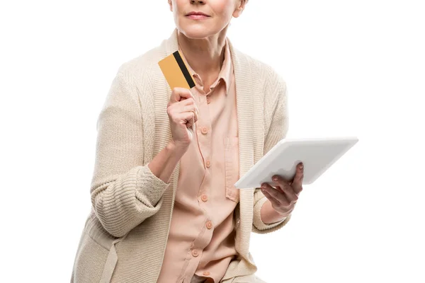 Cropped view of middle aged woman with credit card and Digital Tablet Isolated On White — Stock Photo