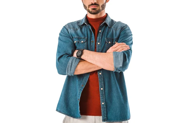 Adult bearded man in denim shirt standing with crossed arms isolated on white — Stock Photo