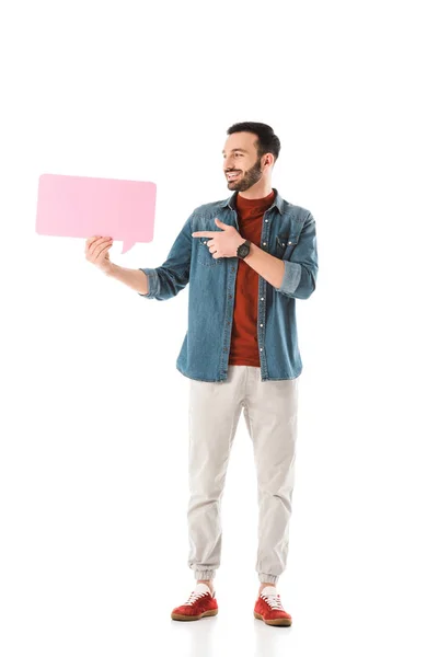 Hombre guapo feliz apuntando con el dedo a la burbuja de pensamiento aislado en blanco - foto de stock