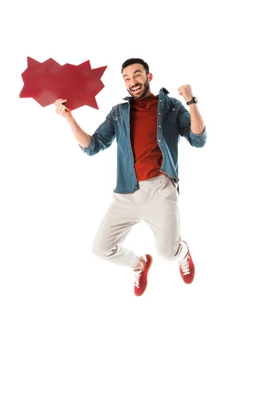 Glücklich schöner Mann mit Gedankenblase springen und zeigen ja Geste isoliert auf weiß — Stockfoto
