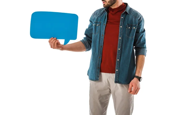 Partial view of adult man in denim shirt holding speech bubble isolated on white — Stock Photo