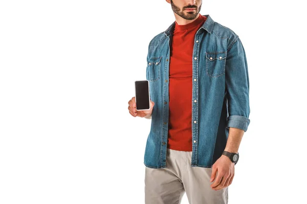 Vue partielle de l'homme adulte tenant smartphone avec écran blanc isolé sur blanc — Photo de stock