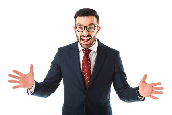 Angry businessman in glasses quarreling and gesturing while looking at camera isolated on white — Stock Photo