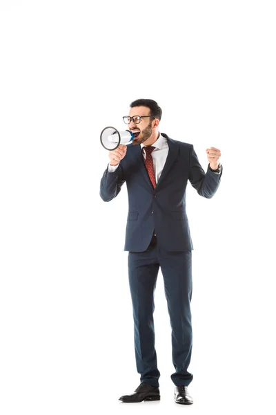 Angry businessman screaming in megaphone and showing fist isolated on white — Stock Photo