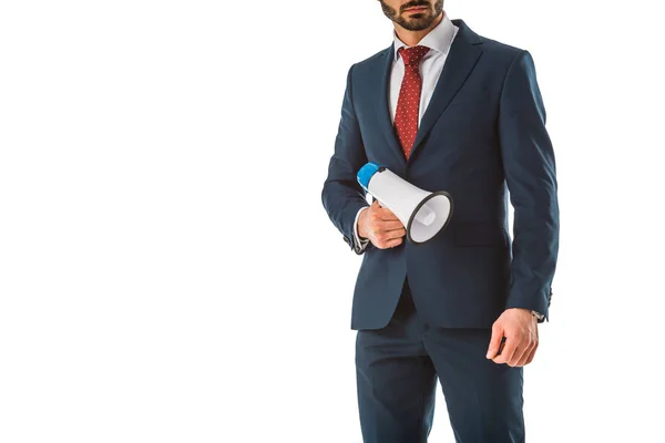 Recortado vista de hombre de negocios en traje negro sosteniendo altavoz aislado en blanco - foto de stock