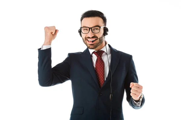 Happy call center operator in headset showing yes gesture isolated on white — Stock Photo