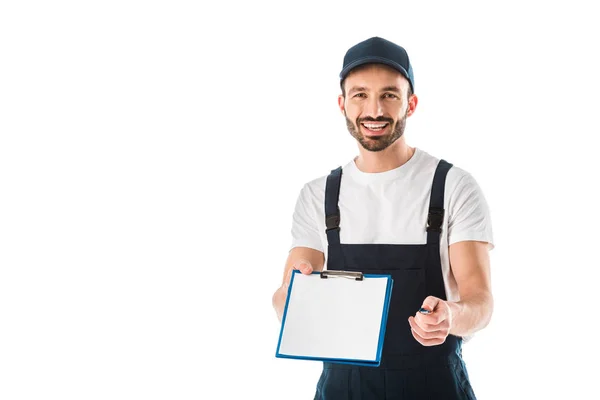 Cheerful delivery man holding clipboard with empty paper and looking at camera isolated on white — Stock Photo