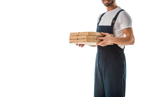 Visão parcial do entregador segurando caixas de pizza isoladas em branco — Fotografia de Stock