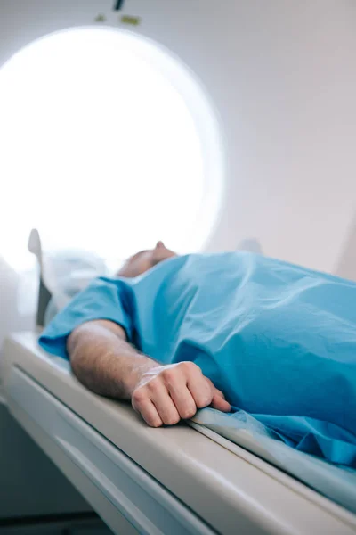 Selective focus of patient having mri scanning test in hospital — Stock Photo