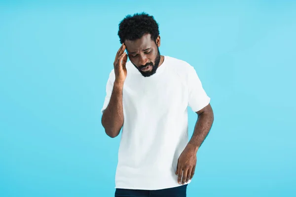 African american man having headache isolated on blue — Stock Photo