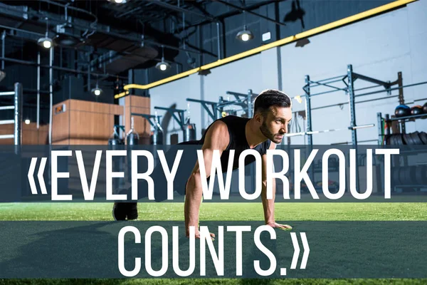 Handsome athletic man doing plank exercise on grass with every workout counts illustration — Stock Photo