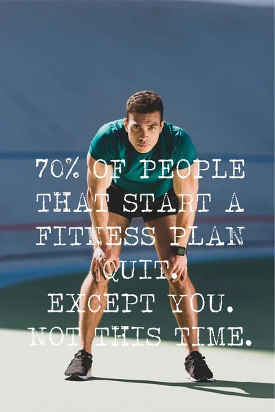 Front view of mixed race sportsman with hands on knees standing at stadium with 70% of people that start a fitness plan quit, except you, not this time lettering — Stock Photo