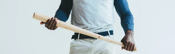 Cropped view of african american sportsman holding baseball bat isolated on grey, panoramic shot — Stock Photo