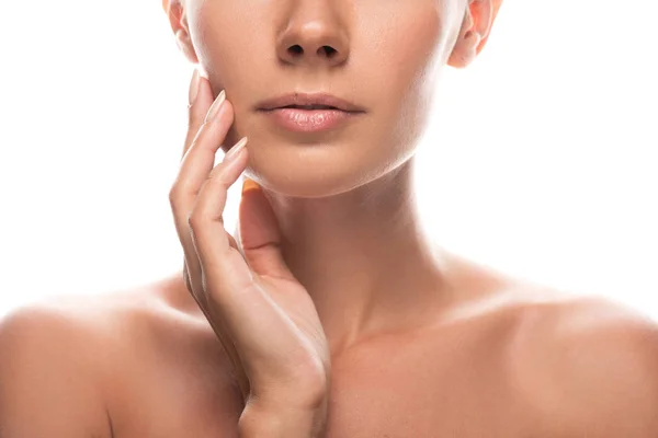 Cropped view of naked young woman touching face isolated on white — Stock Photo