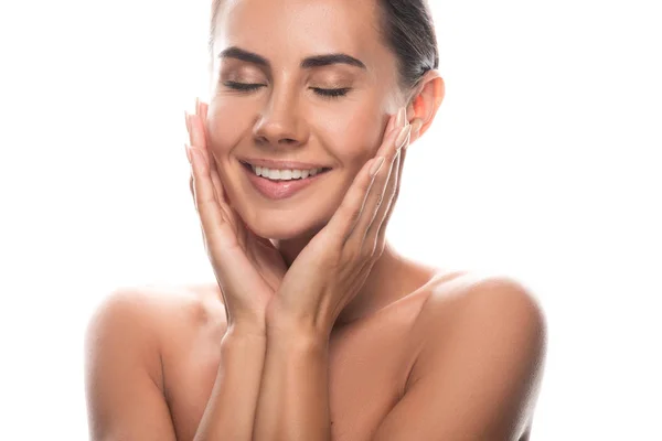 Excité nu jeune femme toucher le visage avec les mains et rire isolé sur blanc — Photo de stock