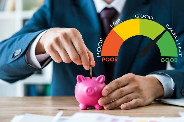 Selective focus of businessman putting metallic coin into piggy bank near speed meter and letters — Stock Photo