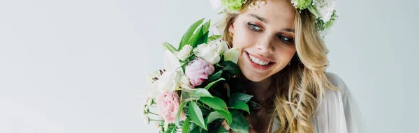 Panoramic shot of attractive and blonde bride holding bouquet isolated on white — Stock Photo