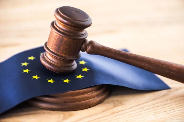 Gavel of judge with european union flag on wooden table — Stock Photo