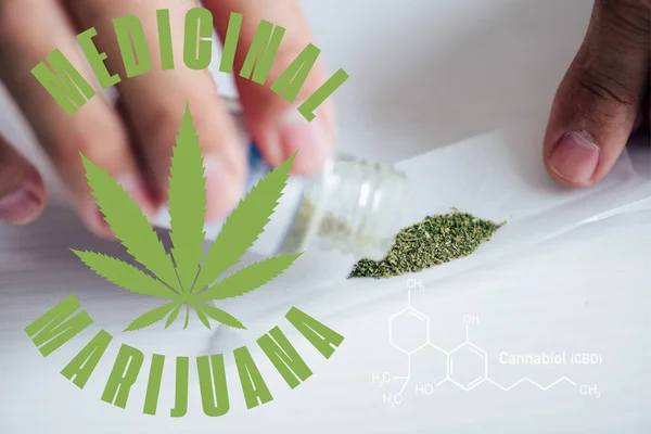 Vue recadrée de l'homme faisant joint de cannabis médical avec illustration de marijuana médicale — Photo de stock