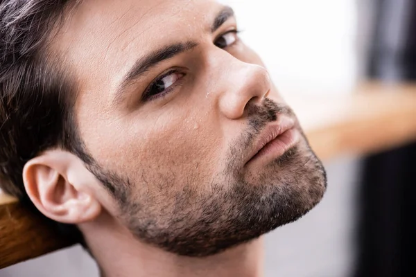 Portrait of handsome sexy man looking at camera — Stock Photo