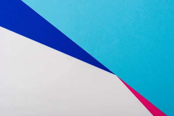 Fond géométrique abstrait avec papier blanc, rose, bleu — Photo de stock