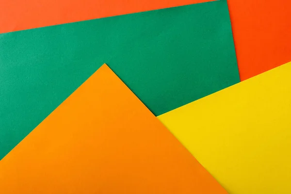 Abstract geometric background with colorful bright paper — Stock Photo