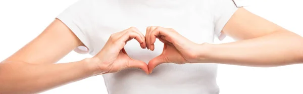 Panoramic crop of woman showing heart sign with hands isolated on white — Stock Photo