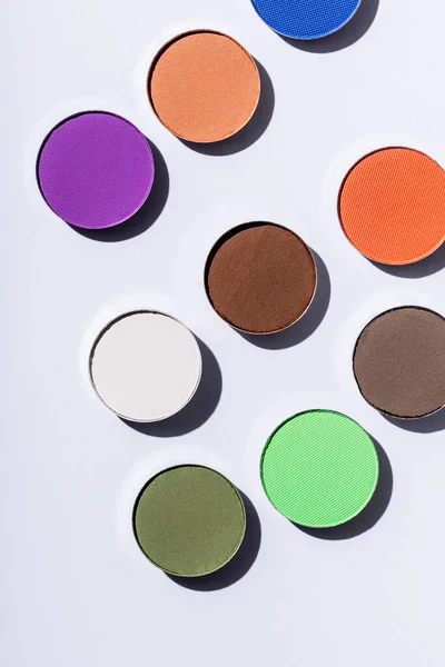 Top view of multicolored eyeshadow on white background — Stock Photo