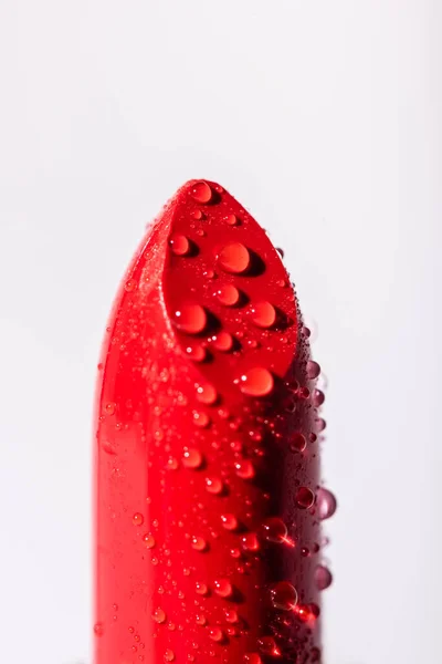 Close up view of red wet lipstick isolated on white — Stock Photo