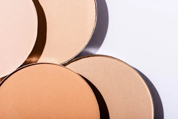 Top view of face powder on white background — Stock Photo