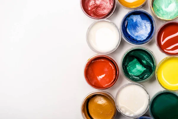 Top view of colorful Gouache paints on white background — Stock Photo